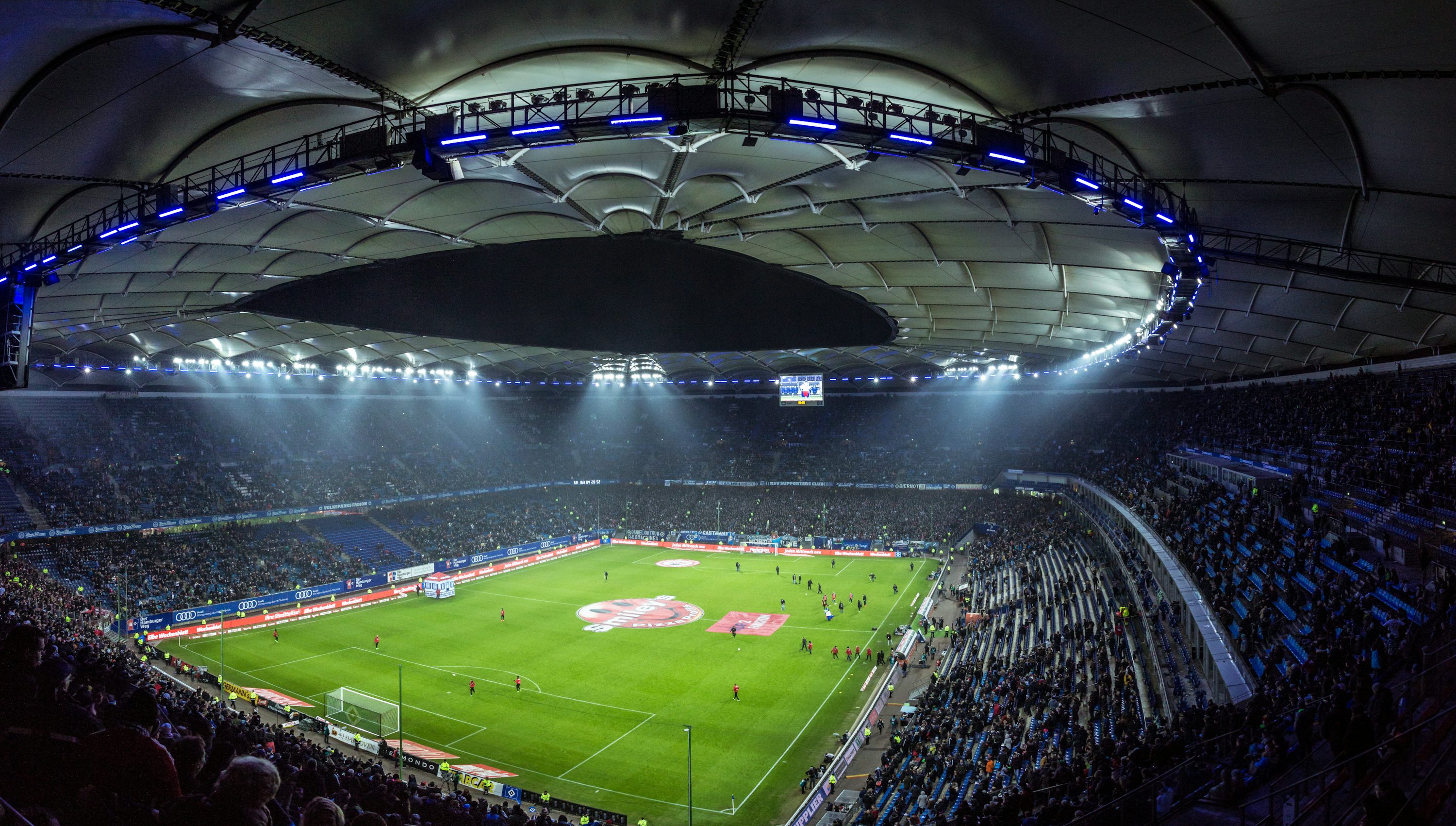 Football stadium at night with dramatic lighting